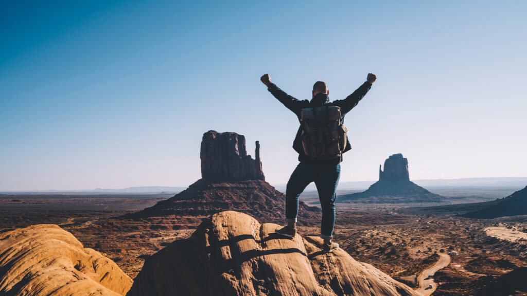 man-on-top-of-cliff